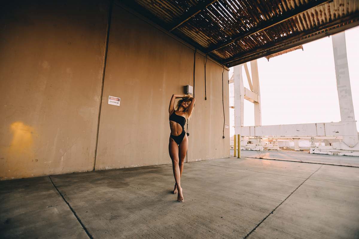 united states woman taking pose brown